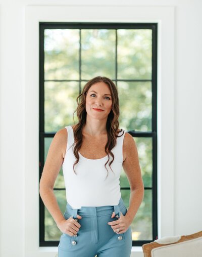 elizabeth standing in front of window