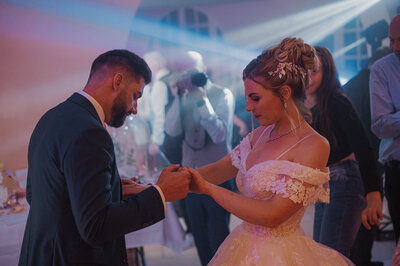 couple kissing and eloping on a mountain in the french alps