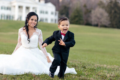 bride-and-young-son-play-winter-wedding-morven-park-leesburg