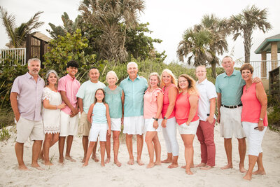 Children playing at the shoreline during family session in Central Florida