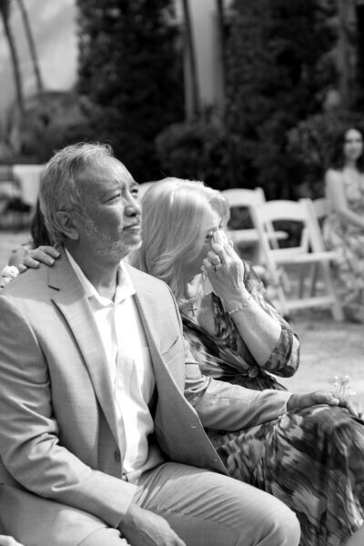Wedding guests crying during ceremony by wedding photographers in jacksonville fl