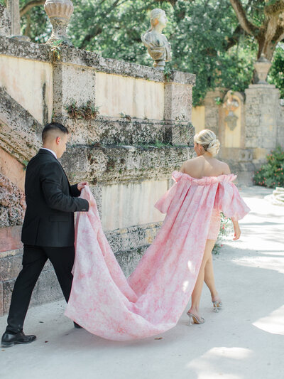 Bride and groom walk up memorial steps at their DC wedding
