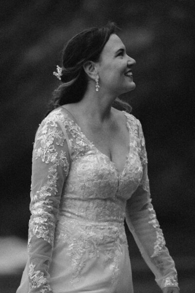 black and white image bride similing