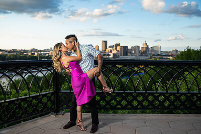 Engaged couple with tatoos overlooking st paul skyline