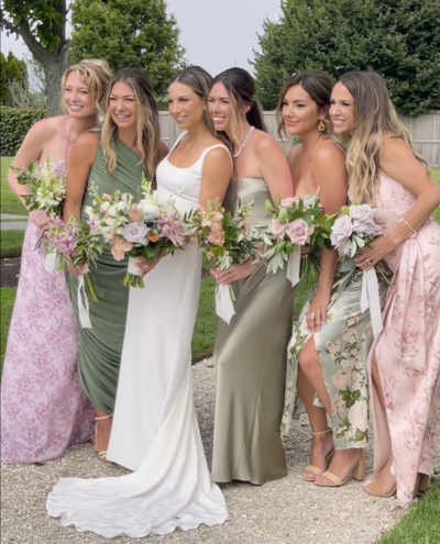 Bride and her Bridesmaids at a an Early Summer Wedding at Belle Mer