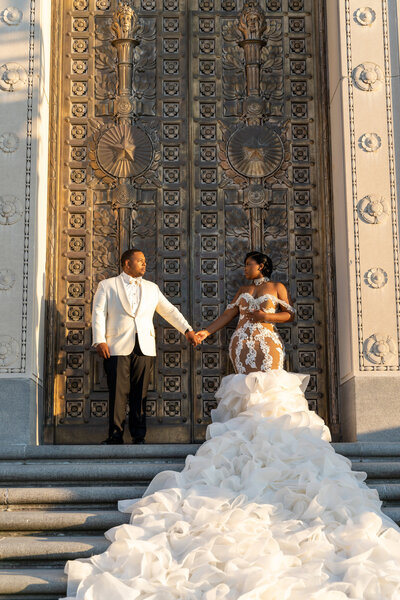 bride and groom holding hand, photographed by top Indianapolis wedding photographer