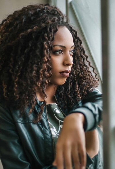 Woman experiencing infertility, pregnancy loss, prenatal anxiety, or postpartum struggles