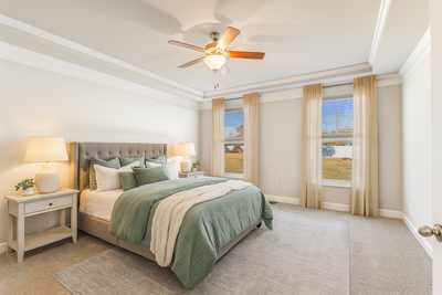 Masterbedroom overlooking oversized fenced in backyard in willow springs nc