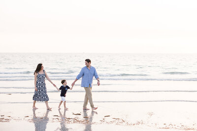 Family walking on the clearwater beach