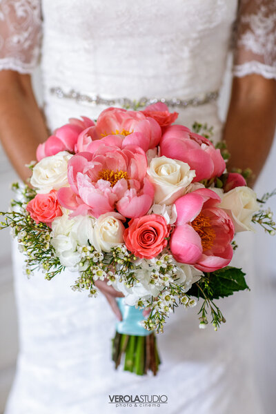bright coral, peach, and pink bride's bouquet