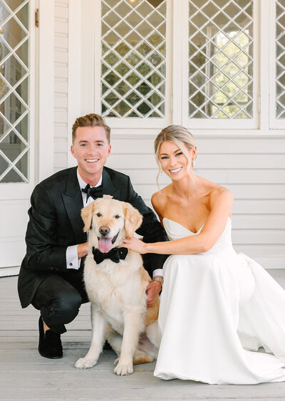Bride and groom with dog at wedding planned by Bianca Nichole and Co
