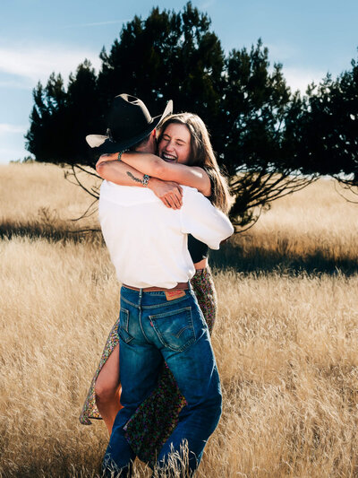 Fun couple engaged featured by photographer Melissa Byrne