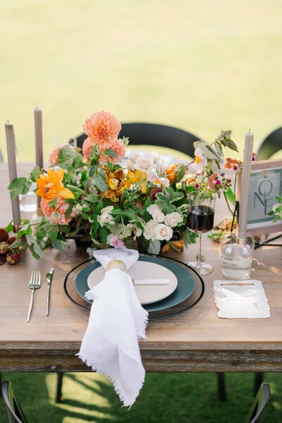 Elegant floral centerpiece at a Pebble Beach Car Week reception