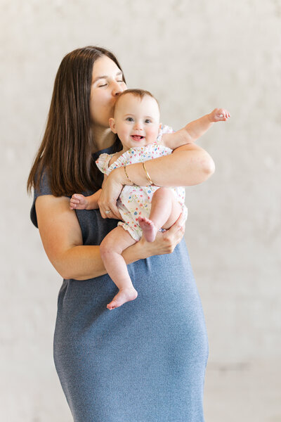 Mother and baby family photography for first birthday photo shoot by Claire Katan.