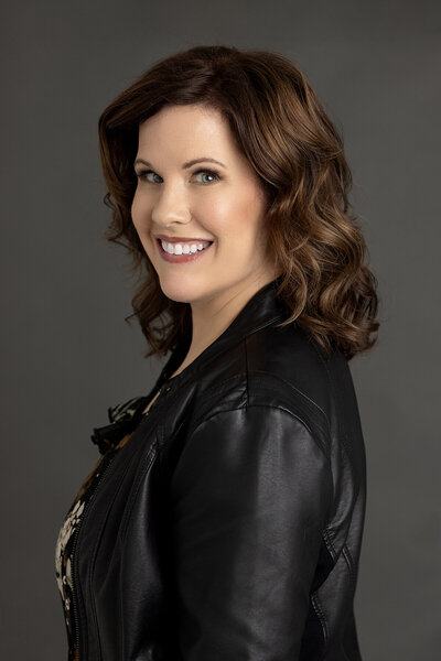Personal branding portrait of an Ann Arbor makeup artist and small business owner, captured in a professional Northville studio.