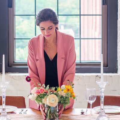 Wedding Planner Noora Barakat Gates sets a table in Southern California