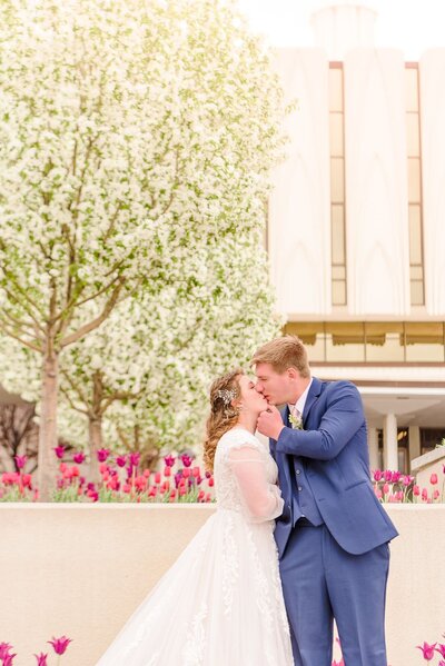 A bride kisses her groom in Charlotte, NC