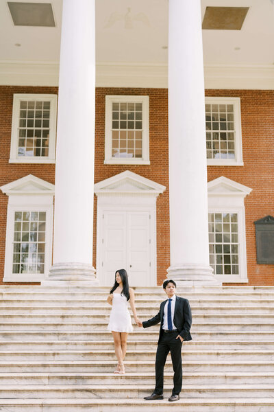 College senior with boyfriend on campus steps