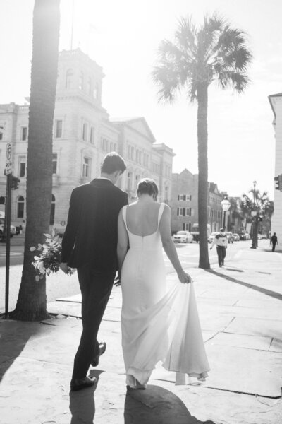 Bride and Groom Walking Through Downtown Charleston - Wedding Planning at the Emeline Hotel