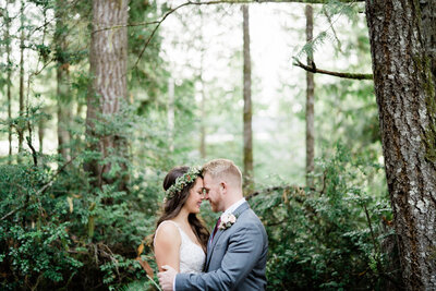 wedding portraits by professional seattle photographers in pnw forest