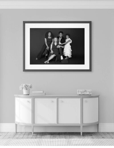 Framed family portrait displayed in a modern living room