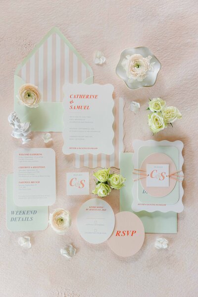Custom modern wedding invitation suite with blue envelopes, floral accents, and textured details for Sonoma County wedding