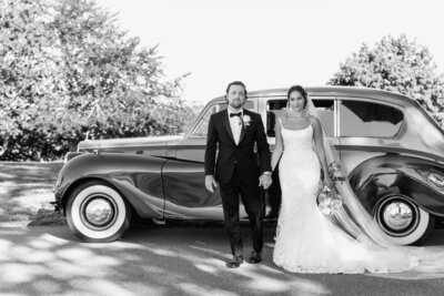 wedding couple in front of classic car rolls royce