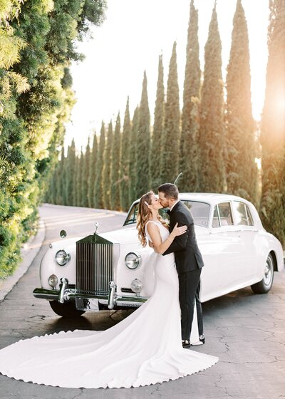 Carmel Mountain Estate blush, black tie wedding with classic car.