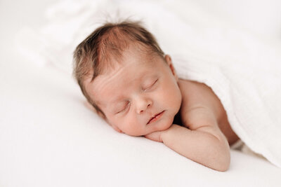 Baby Boy on White background sleeping
