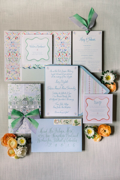 Light and airy wedding invitation suite with custom calligraphy