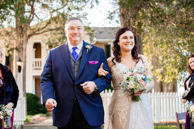 Bride walking with her dad down the aisle at Cedarmont