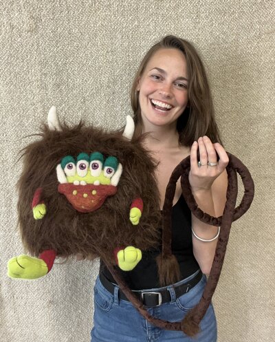 Natalie holding unique stuffed animal