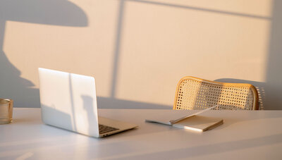 light and airy photo of laptop on desk
