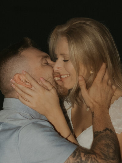 a close up photo of a couple about to kiss in the lake. photo by dash and boheme photography 