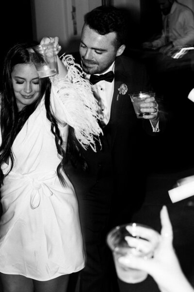 Bride and groom on dance floor at the Luminaire wedding venue in Texas