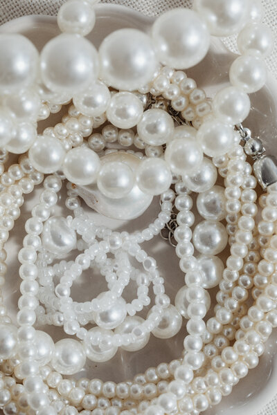 Strings of pearls all laid out on one another