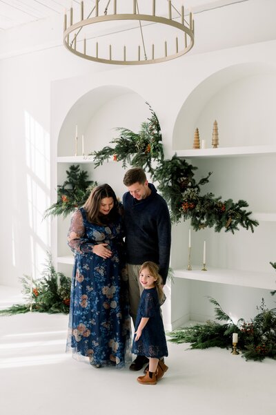 Family wearing blue for Holiday photos.