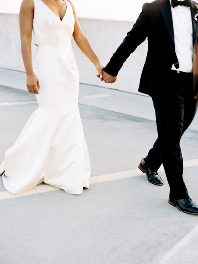 Bride and Groom walking on rooftop