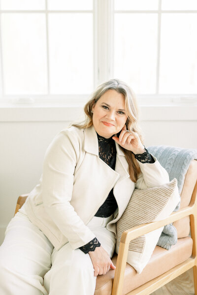 Professional headshot of Laura Stansberry, a luxury maternity and family photographer in St. Louis."