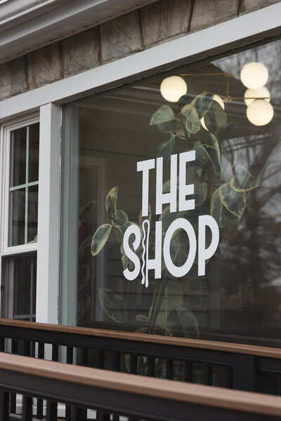 Exterior building photograph of local hair salon in Latham, New York