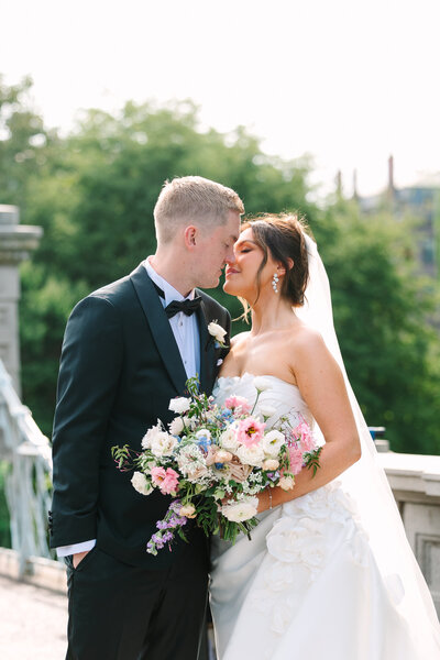 bride and groom touching foreheads