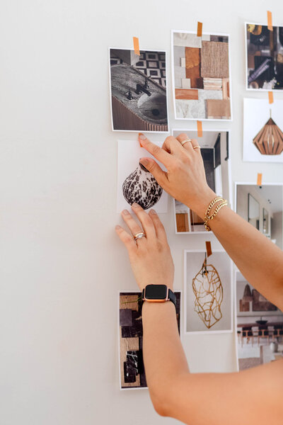 Interior designer Taleah Smith creating a visual mood board for a design project