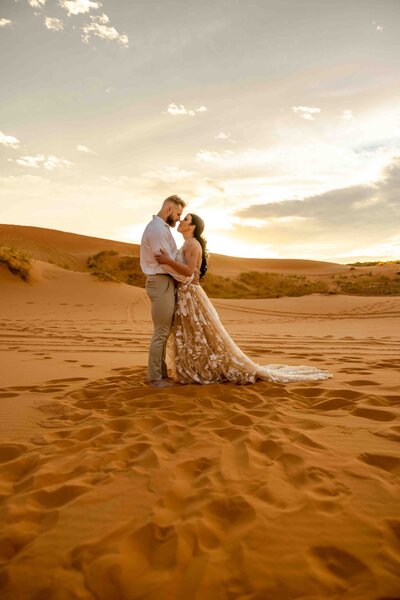 Kissing in the sand dunes in utah