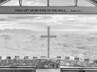 Cross with the mountains behind it at the Fred W. Symmes Chapel (“Pretty Place”) in South Carolina.