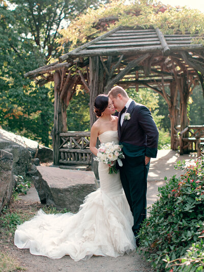 boho bride and groom in forest