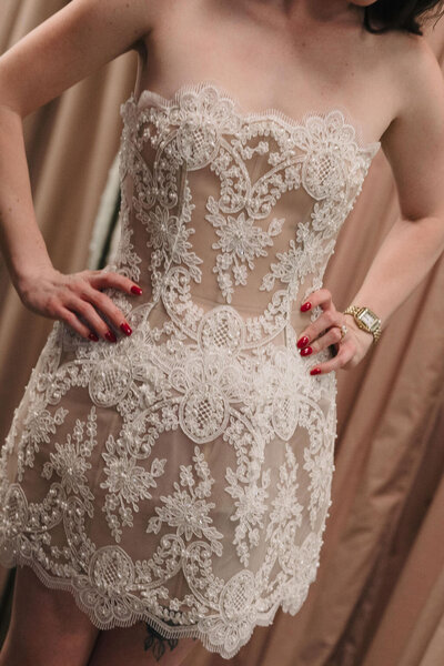 black and white image bride wearing off the shoulder textured wedding dress