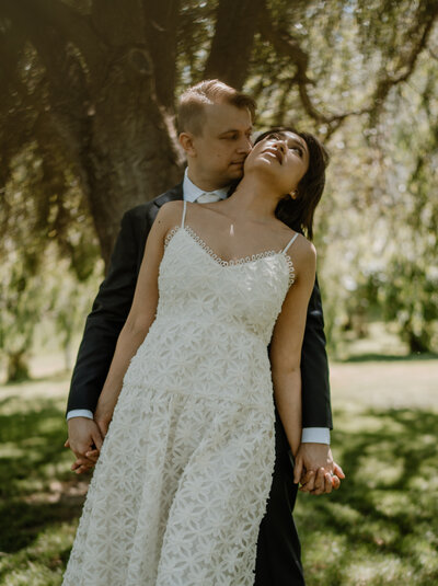Candid engagement session in Spokane, Washington, capturing the laughter and connection between a couple in love.