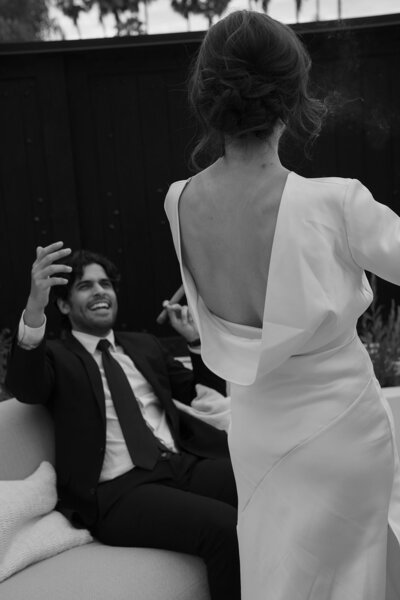 wedding couple candid black and white photo