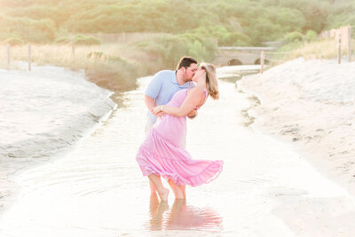 Couple kissing on the beach at the myrtle beach state park