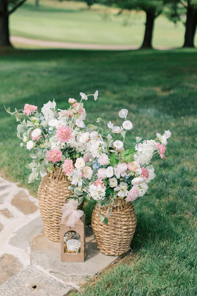 Ceremony florals in baskets